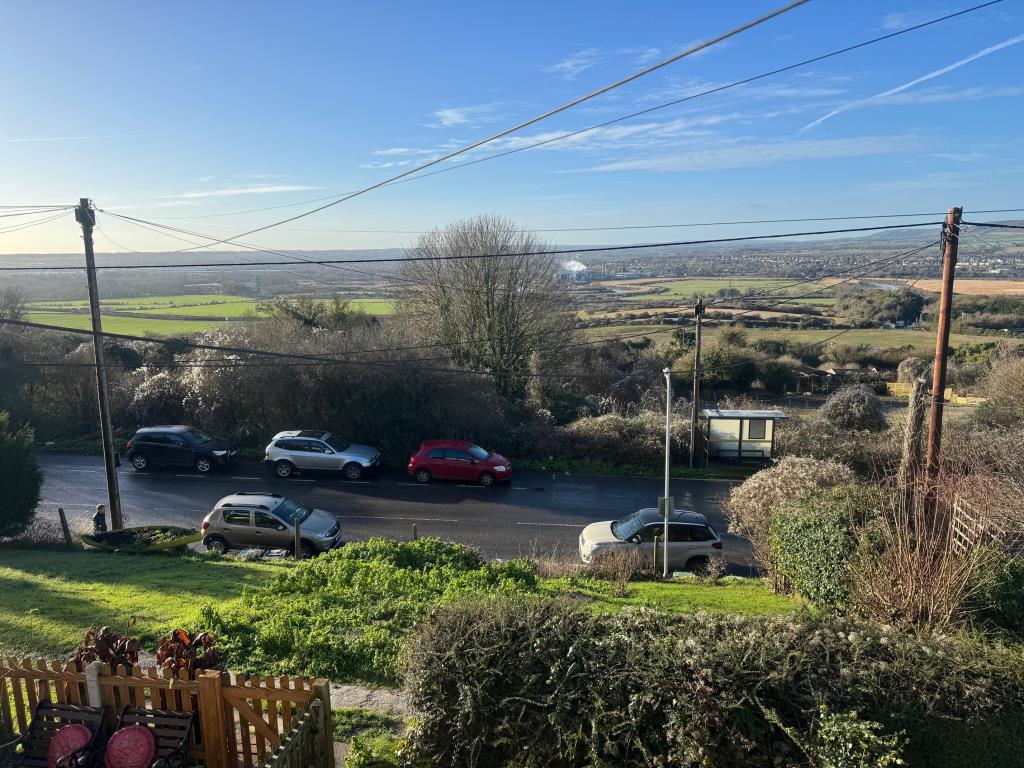 Lot: 132 - MID-TERRACE COTTAGE FOR IMPROVEMENT - View from the front bedroom